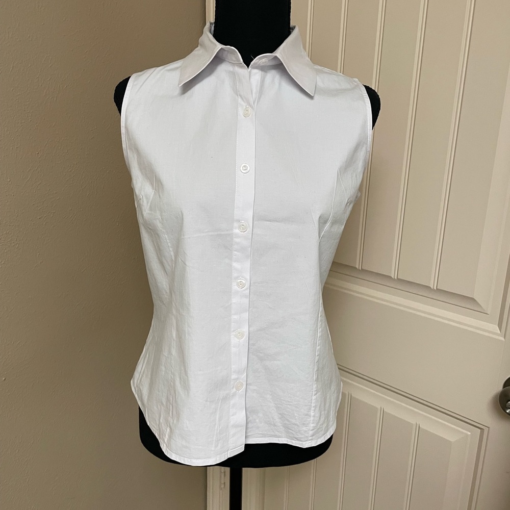 White sleeveless blouse